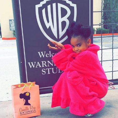 Lyric Kai Kilpatrick posing for a photo in front of The Warners Studio.